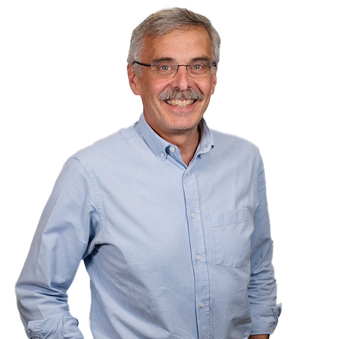 John Blake with a blue shirt