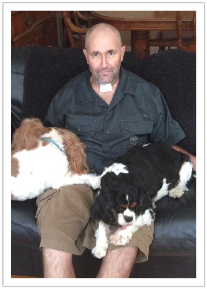 Jerry Vrabic finally back home with two very happy puppies