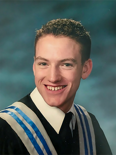Headshot image of Brad Howell's graduation photo