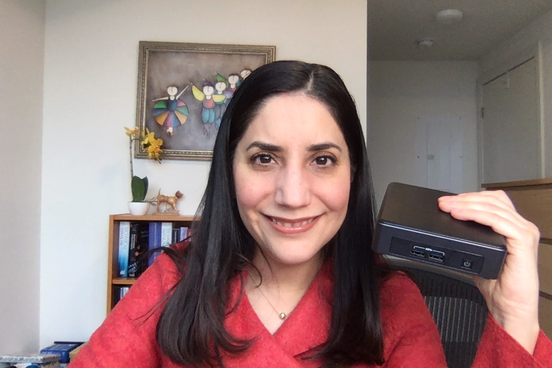 Dr. Montemayor-Garcia holds the small and portable yet powerful computer that she uses to interpret blood group antigens from vast amounts of genomic data.