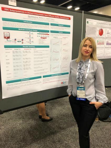 Olga presenting her poster at AABB 2019