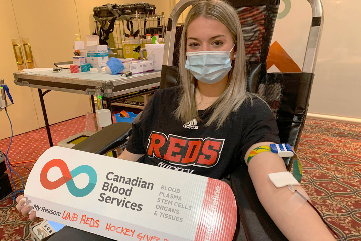 Alayna Wagstaff donating blood