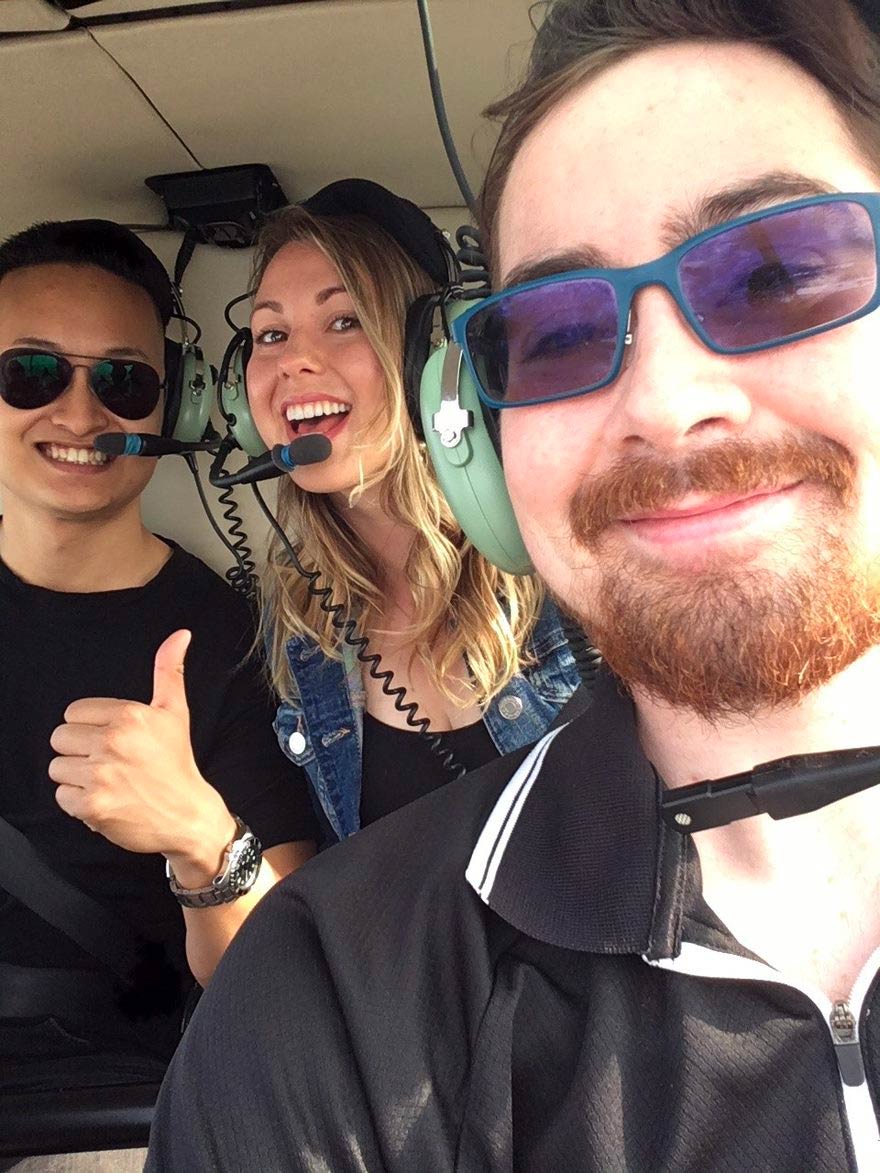 Bruce Jillian and Myles in Helicopter over skyline as Myles recovers from third transplant