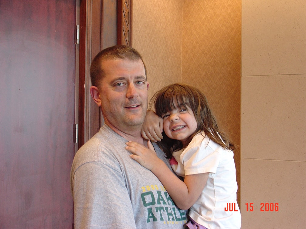 Stem cell donor Dave Charlebois carries his recipient Sarah Byrne