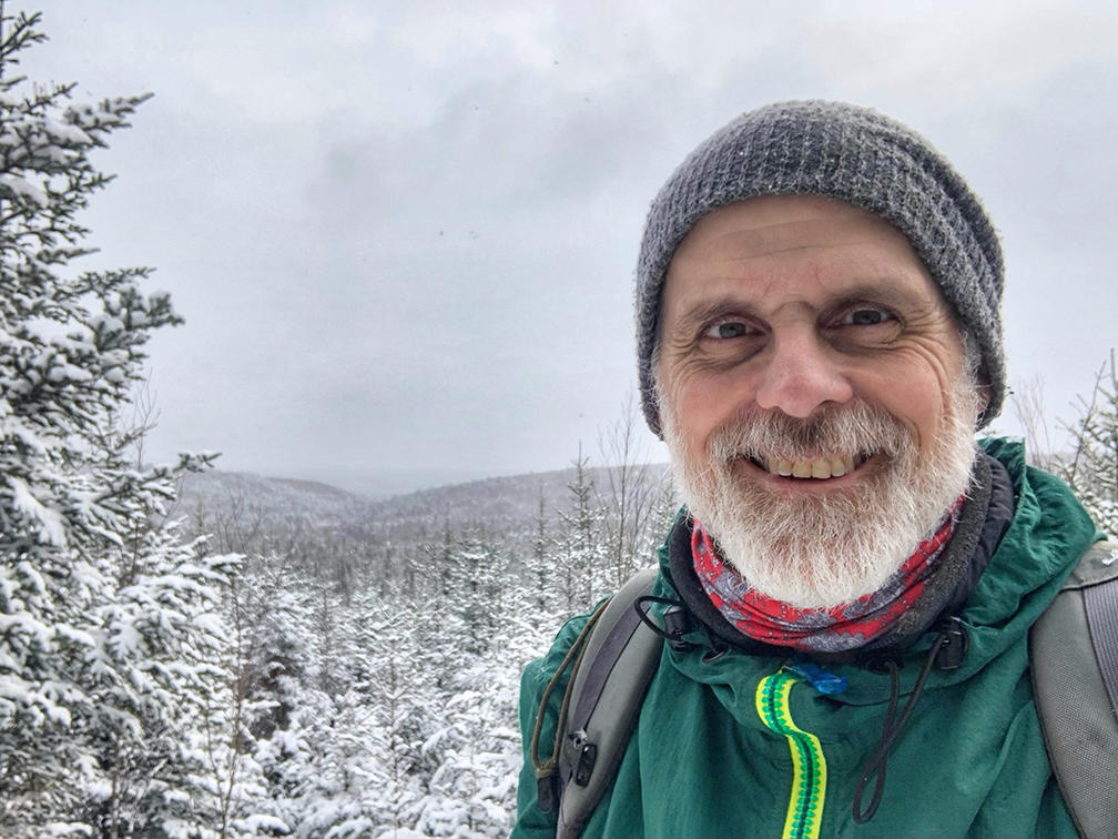 Jonathan Riley, a blood recipient, takes a selfie on a hike