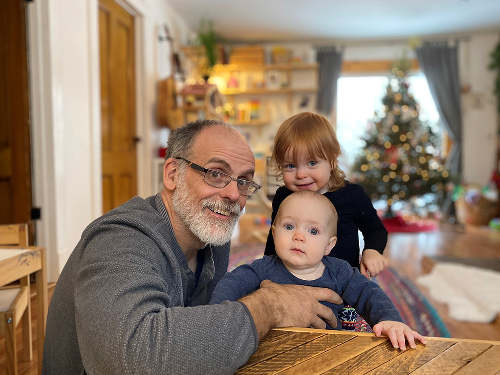 Jonathan Riley, a blood recipient, celebrating Christmas with his granddaughters