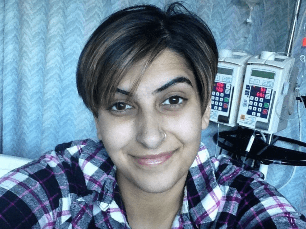 blood and stem cell recipient, Moneet Mann takes a selfie in the hospital