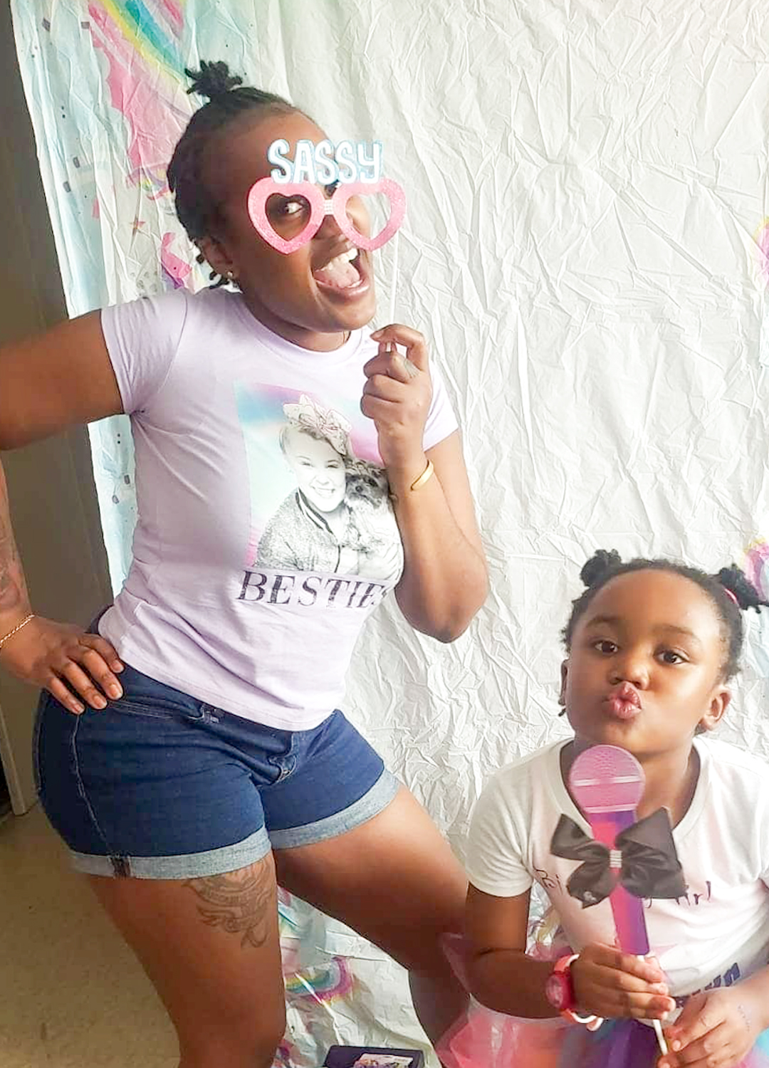 Image of Jamaique Rose on the left hanging out with her daughter Brooklyn playing dress up
