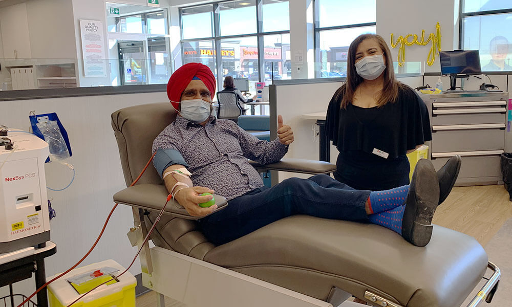 A plasma donor at his first plasma donation at the Brampton plasma donor centre