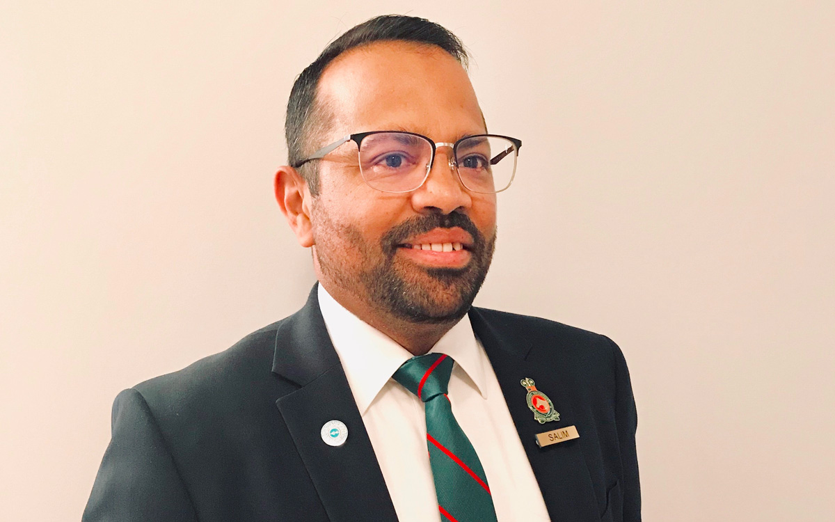 Salim Amlani proudly wears his Ismaili Volunteer Corps uniform