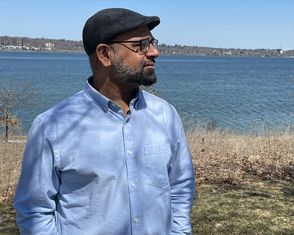 Kidney recipient looking into the distance with Lake Simcoe in the background