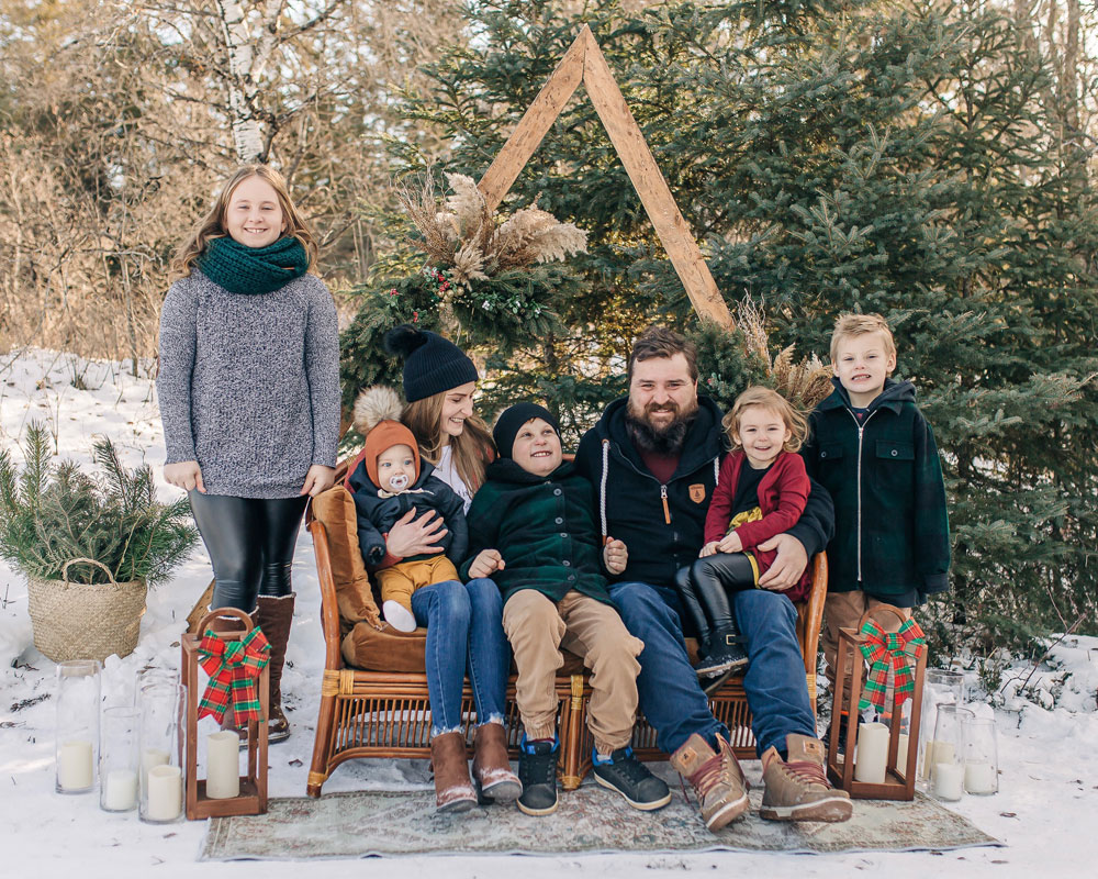 Family on a bench on a sunny winter day