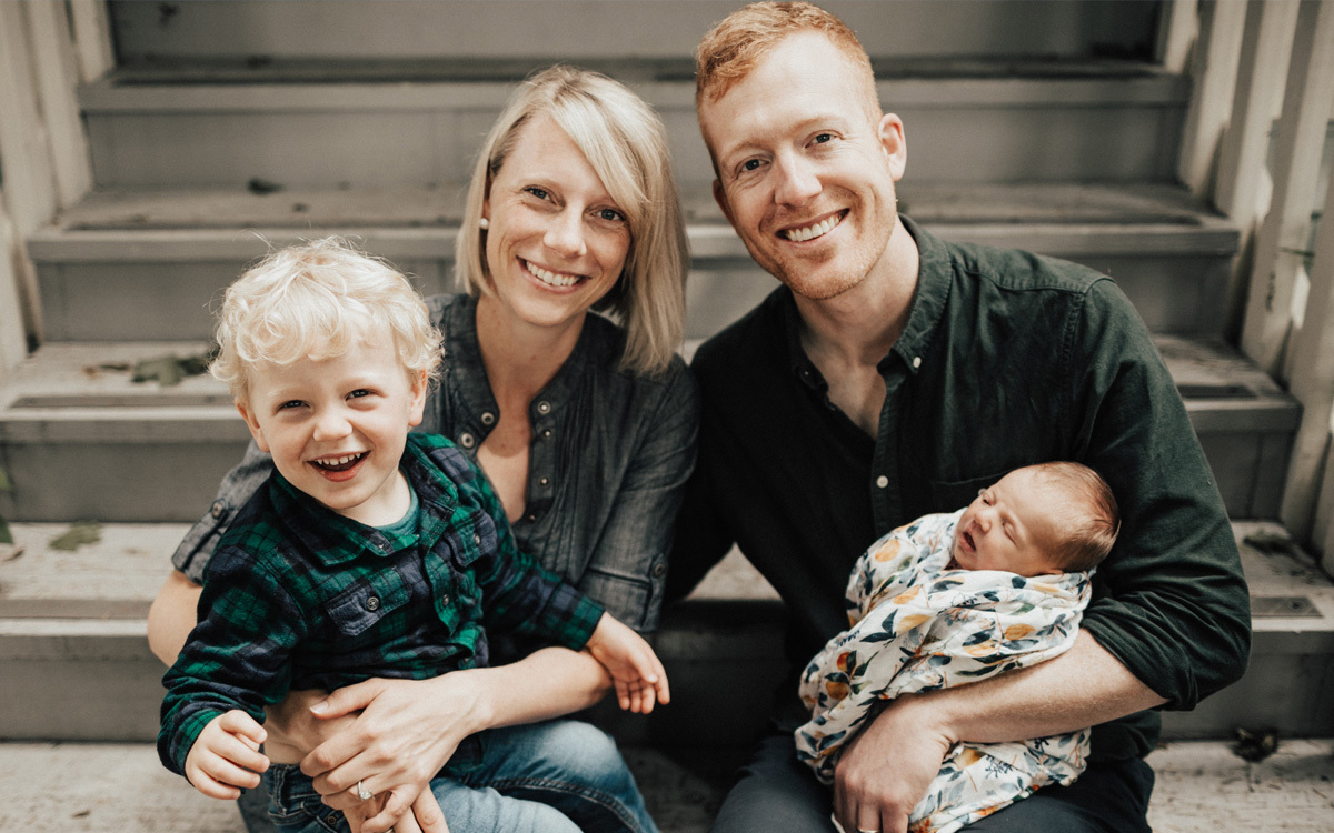 The Munk family: Rebecca, Tyler, Theodore and by Eliza all pose happily in a family portrait on the stairs of their Vancouver home.