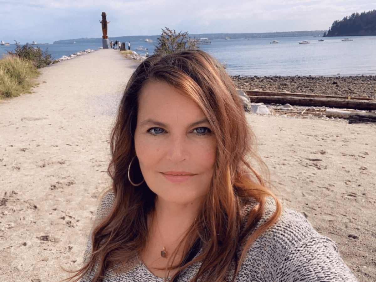 Blood product recipient, Trish Ganam on a beach in Vancouver