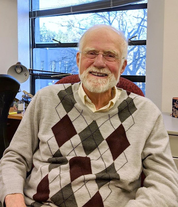 Dr. Michael McDonald sitting down