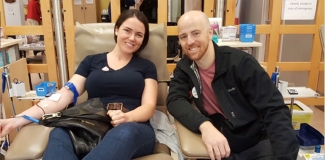 Officer Matt Oakes with girlfriend and first-time donor, Chelsey, at the November to Remember kick-off event in Hamilton.