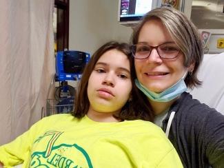Abby, left, with her mother, Dawn, donated stem cells for her brother in March 2020.