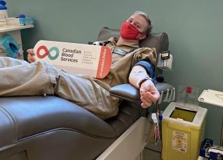 Flight paramedic Danny Kustra joined a group of nearly 40 other paramedics to donate blood in May. 