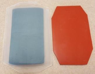 Old foam-based centrifuge inserts (left) and longer-lasting silicon inserts (right).