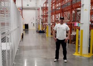 Ryan Elgert standing in Canadian Blood Services warehouse