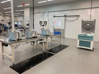 three units shown on left of photo) and centrifuge (on the right) in the Canadian Blood Services manufacturing site in Brampton, ON