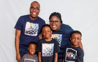 Parents Ronald Felix and Nahomie Aceline pose for a photo with their three sons, Joiakim, Micah and Hezekiah Felix. Joiakim and Micah have sickle cell disease.