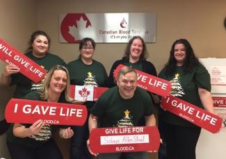 Sobeys on Allen Street in Charlottetown together holding up I gave life signs advocating to donate blood.