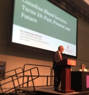 Graham local day ISBT CEO Graham Sher giving a keynote presentation