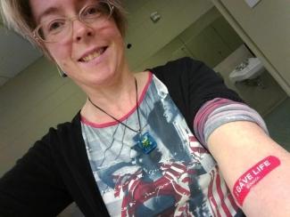 It’s still in ME to give! Whoopee! A blood donor once again, with a snazzy bandage to prove it. 