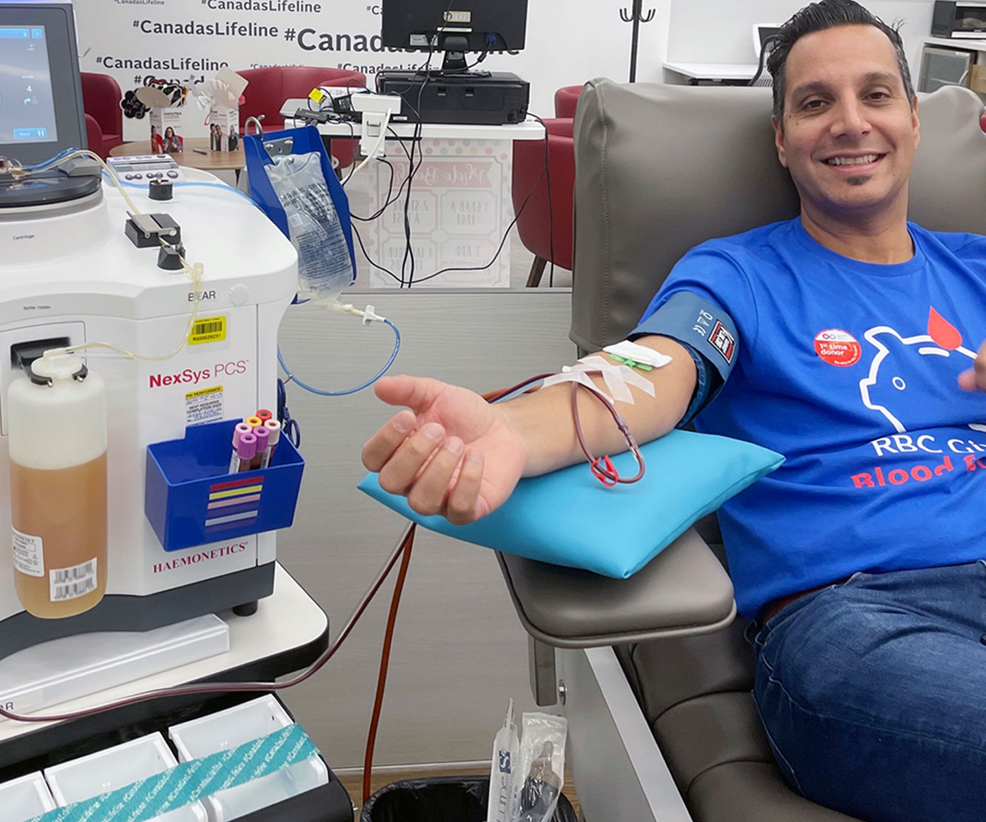 Plasma donor in a bed at a Canadian Blood Services plasma donor centre