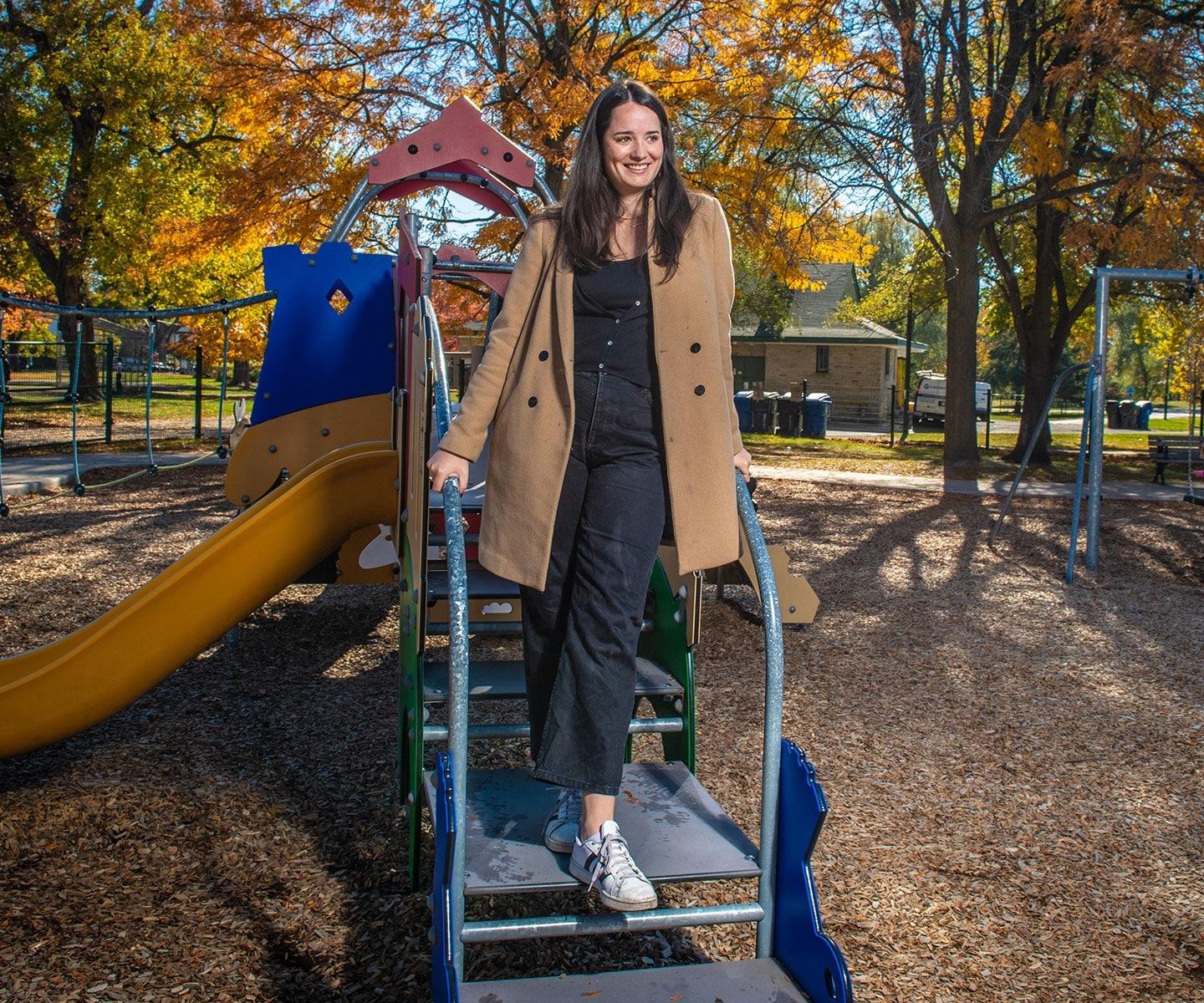 Living kidney donor on the steps of a playground structure