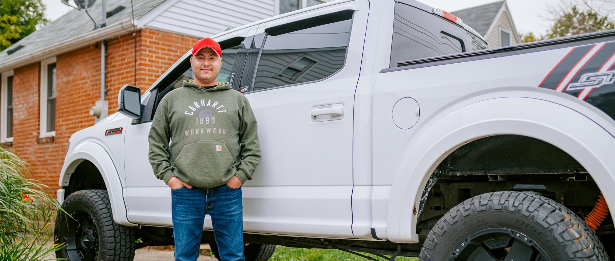 Scott Monds of Dundas, Ont. stands in front of his truck. He has received two stem cell transplants from a single stem cell donor.
