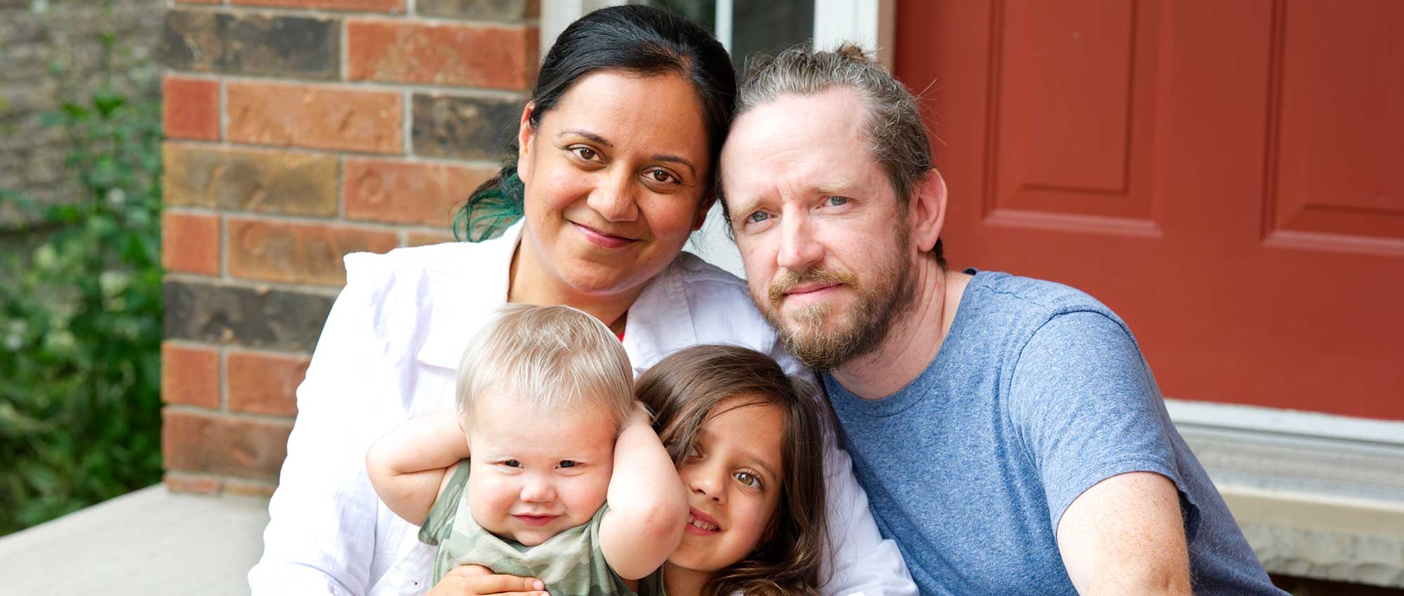 Cord blood donor Manny Ford and her family on the front porch