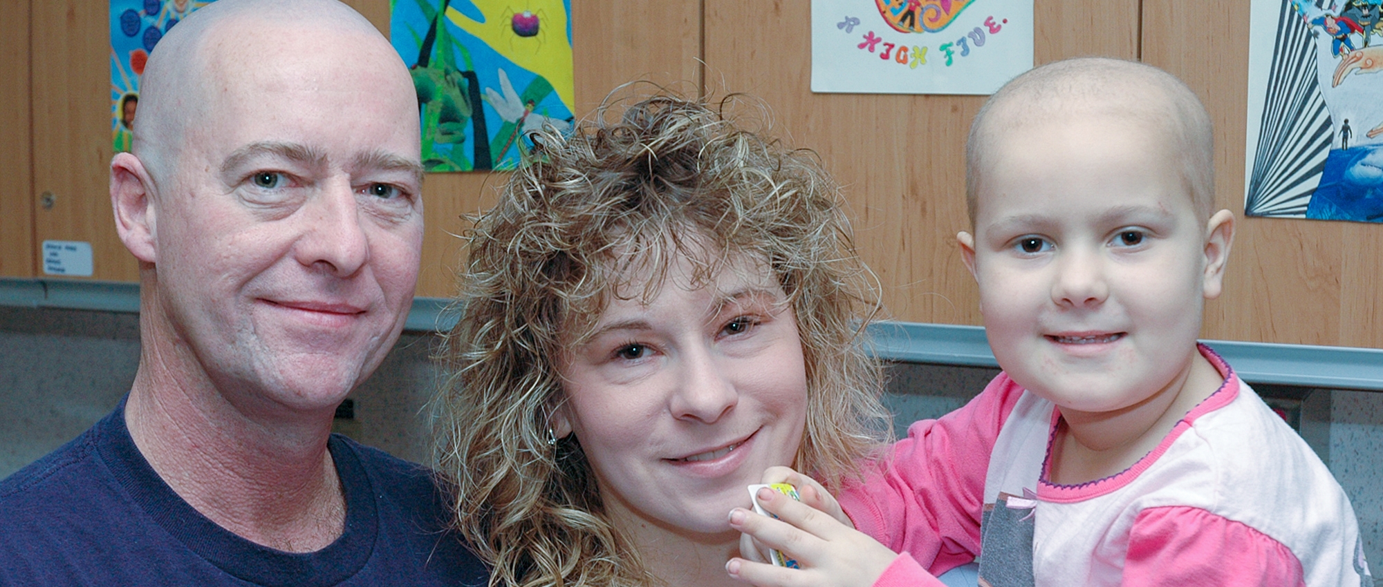 Five-year-old Rachelle with her family while in treatment for cancer