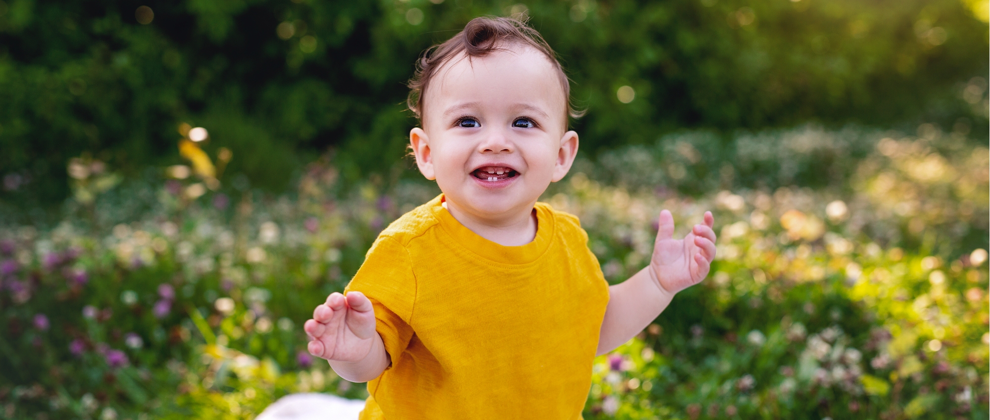 A young boy plays in a field. Jakob Guziak was diagnosed with SCID (adenosine deaminase severe combined immunodeficiency), days after his birth. He urgently needs a stem cell transplant.