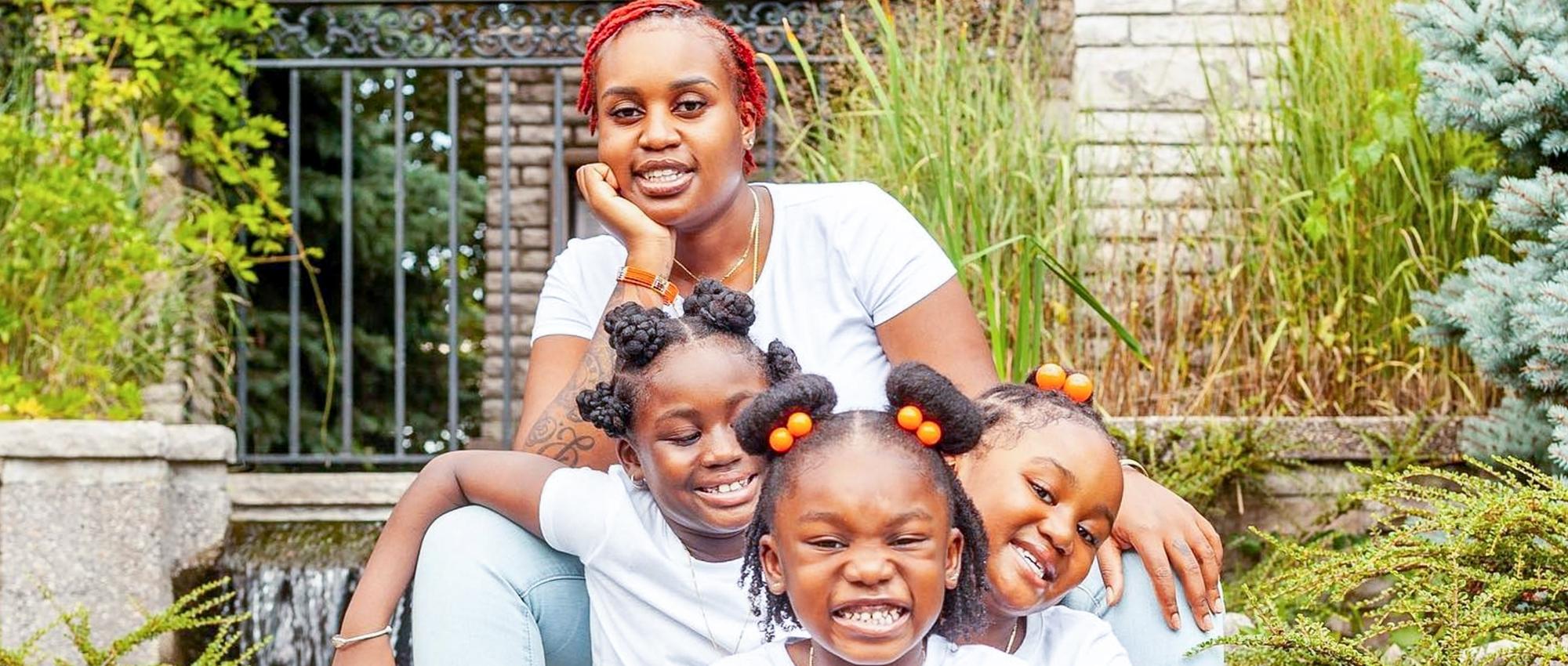 Jamaique Rose poses with her three daughters. Jamaique urgently needs a stem cell transplant. She urges Black Canadians to join the stem cell registry.