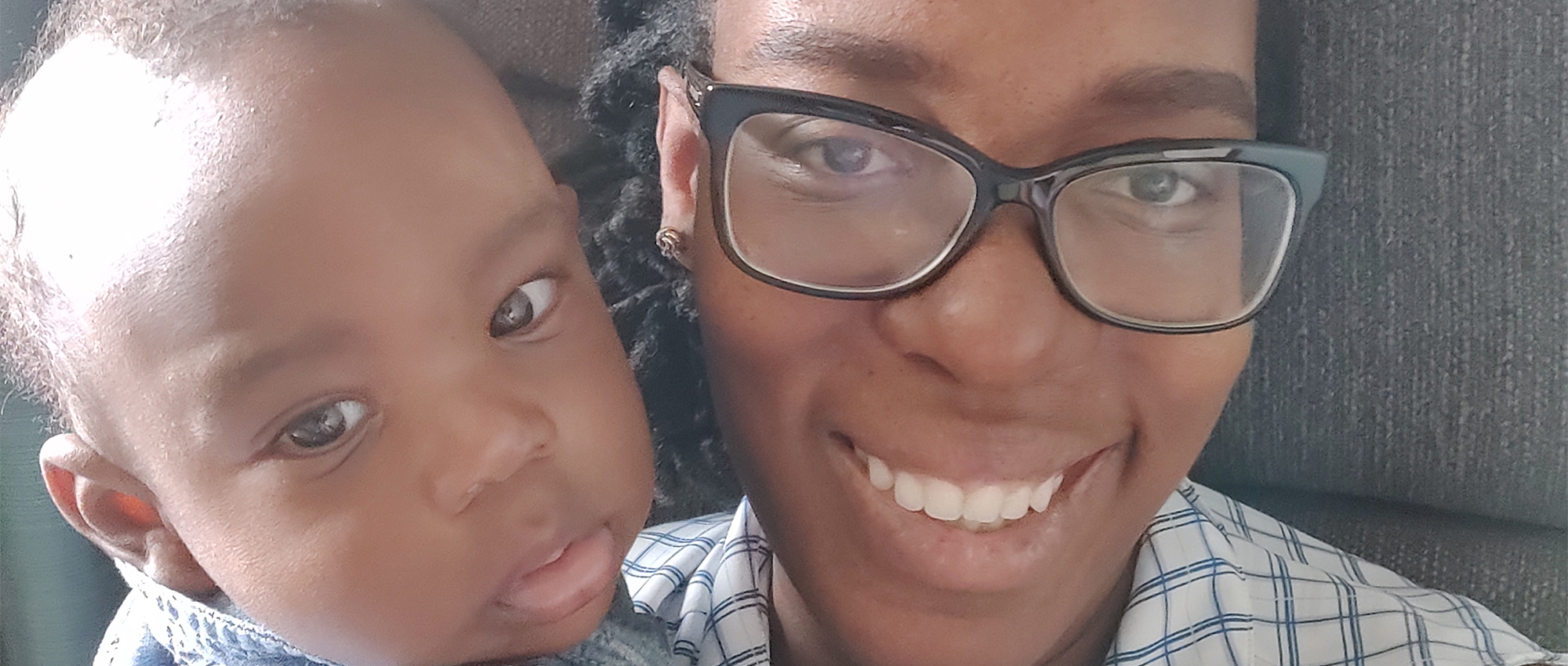 Featured image of mother N'kem Odita and her son Marcus sitting down on a couch.