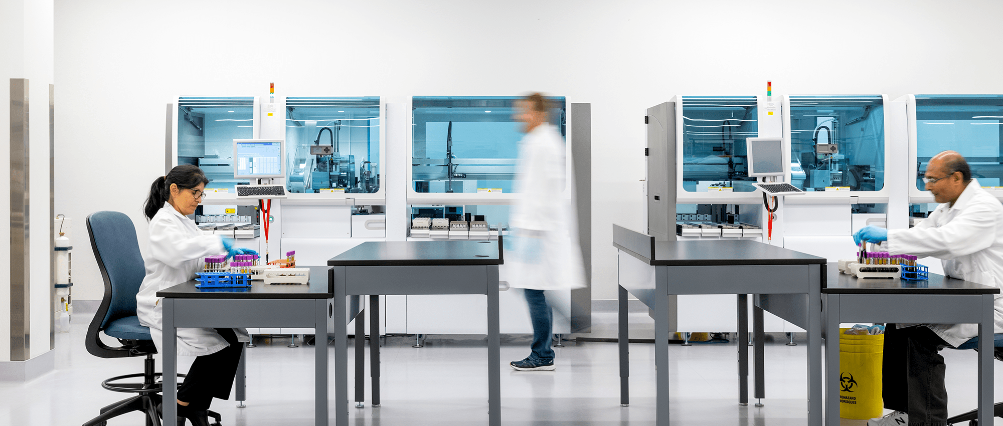 three scientists in a lab