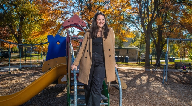 Living kidney donor on the steps of a playground structure