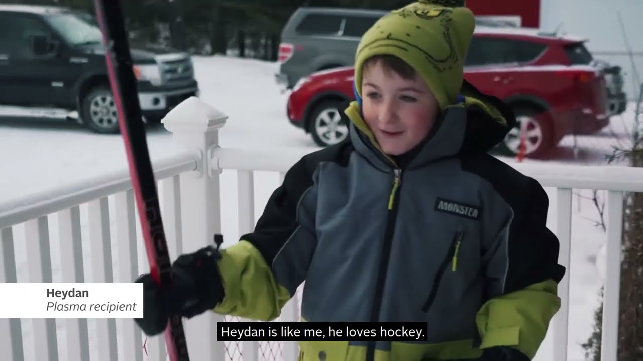 YouTube video thumbnail of Heydan, plasma recipient with caption &quot;Heydan is like me. He loves hockey.&quot;