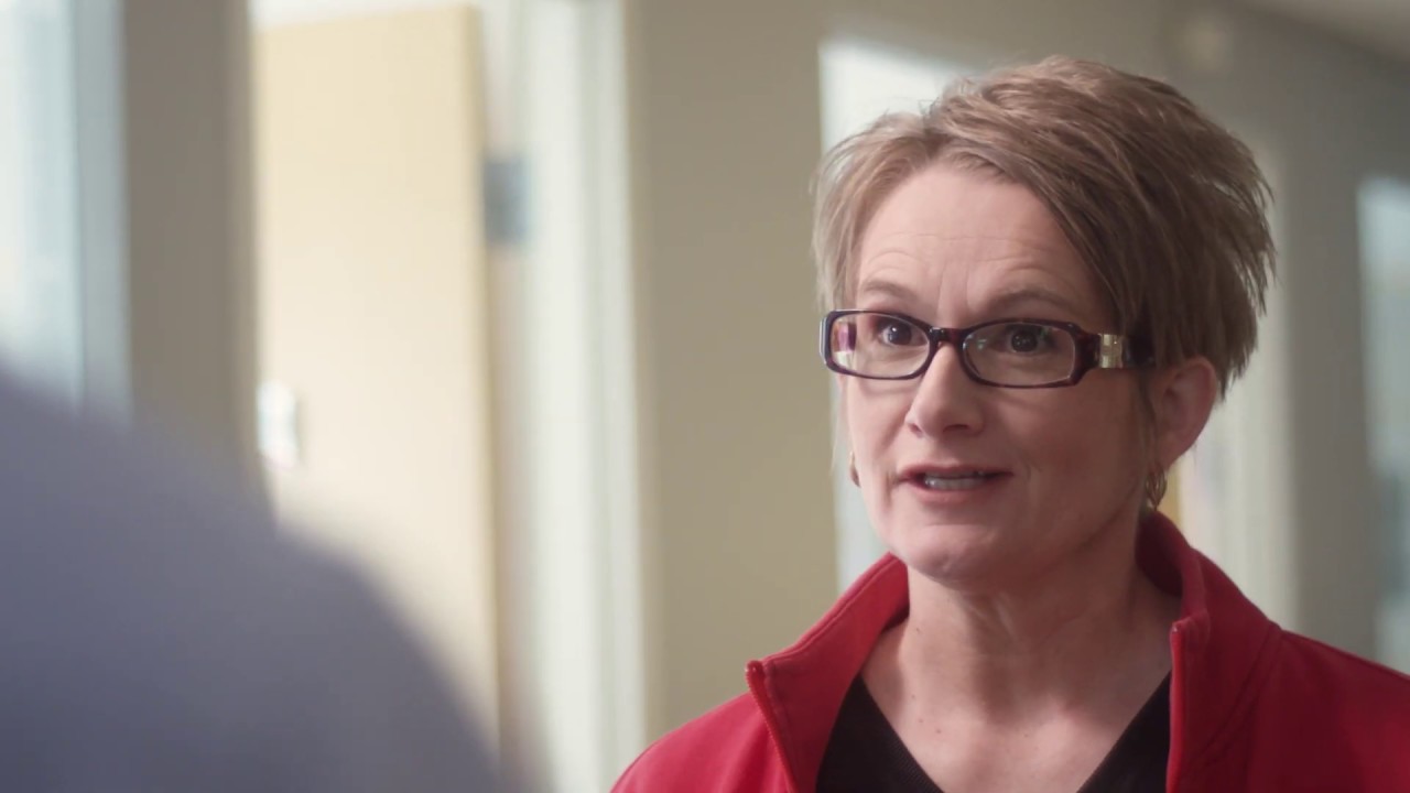 YouTube video thumbnail of woman with glasses